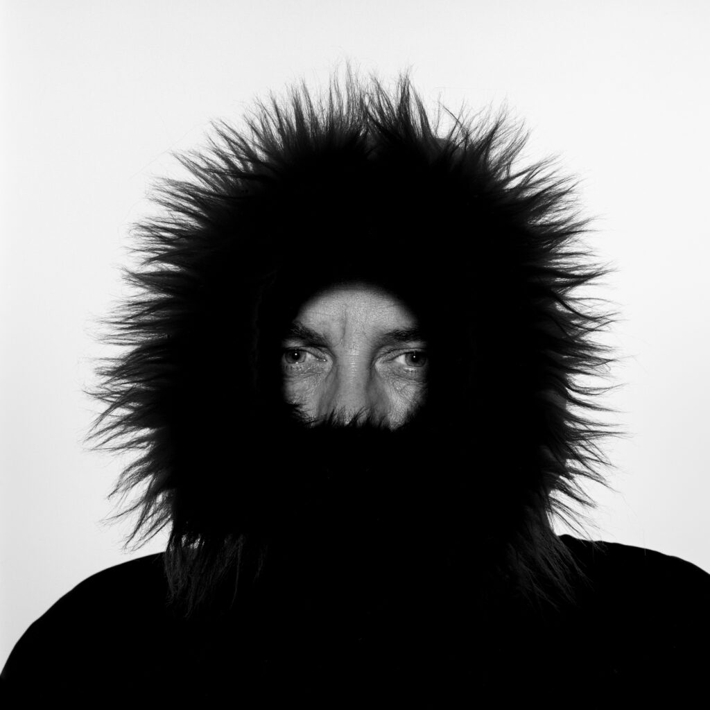 Abstract photo of a man with a circle of fur around his face