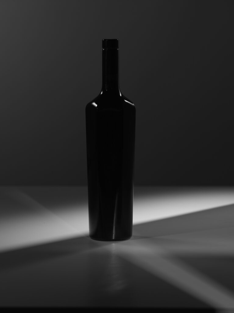 Shadowed view of a Neotempo wine bottle